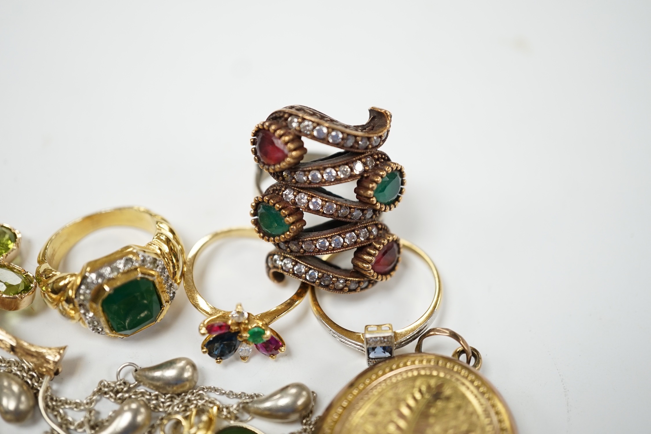 Assorted jewellery including a French yellow metal(18ct mark), ruby, sapphire, emerald and diamond cluster set dress ring, size J/K, a 1920's 18ct and plat, sapphire and diamond set rectangular cluster ring, gross weight